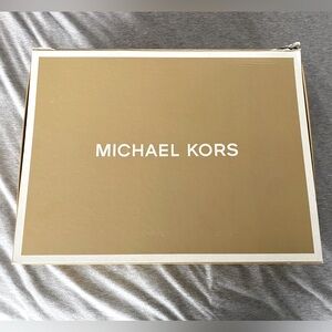 Michael Kors Bag with 3 closures, two open and one zip.